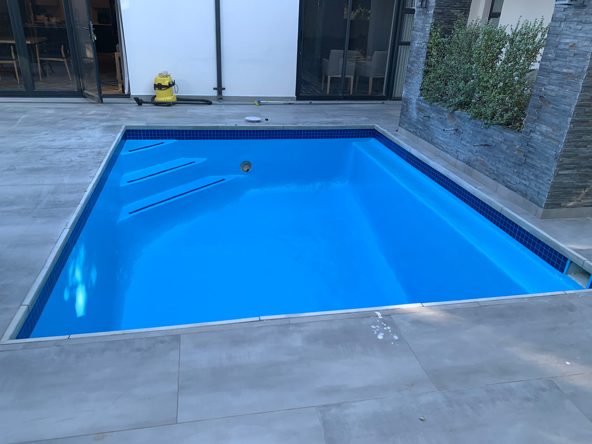 Freshly finished blue swimming pool built by Volks Pools in Cape Town